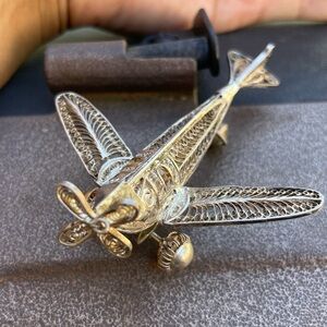Vintage solid 925 sterling silver filigree airplane with movable wheels